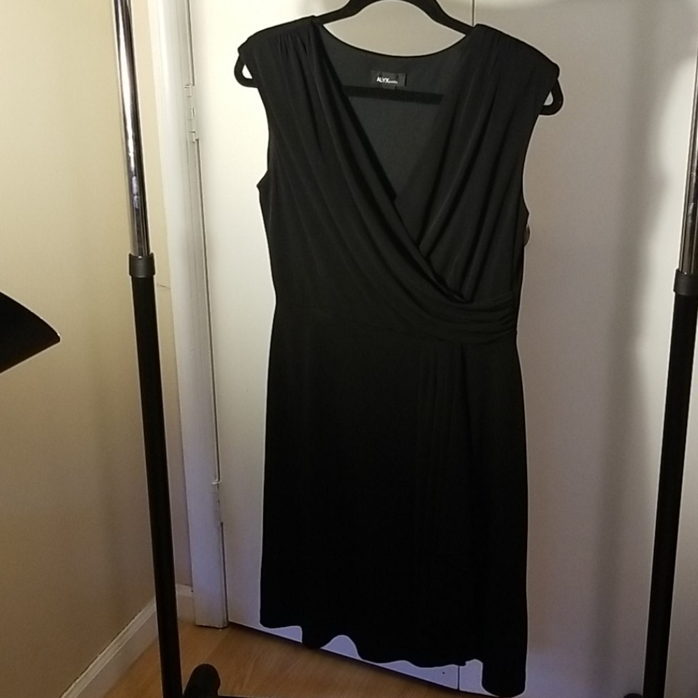 Flattering surplice neckline black dress